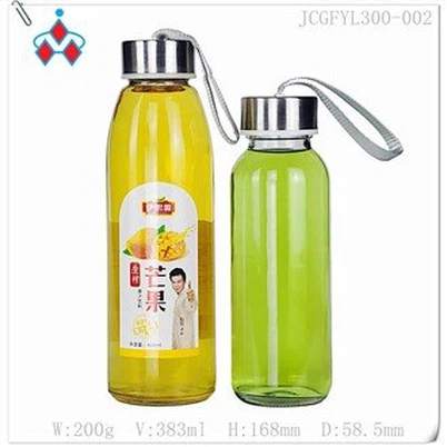 ग्लास फलों के रस की बोतल